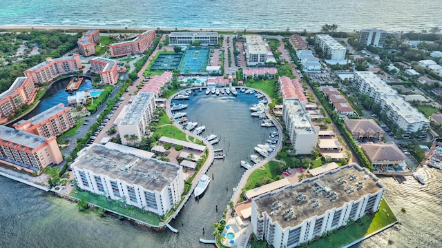 birds eye view of property featuring a water view