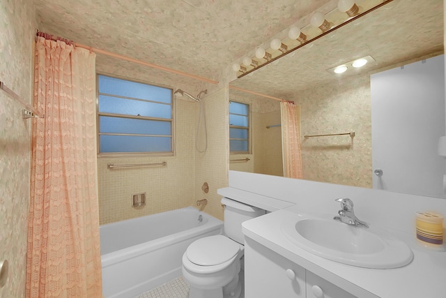 full bathroom featuring tile patterned flooring, shower / bath combo, vanity, and toilet