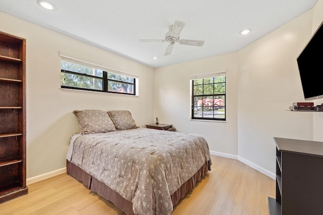 7825 Lexington Club Blvd Unit B, Delray Beach, FL 33446 - bedroom featuring light wood-style floors, baseboards, and recessed lighting