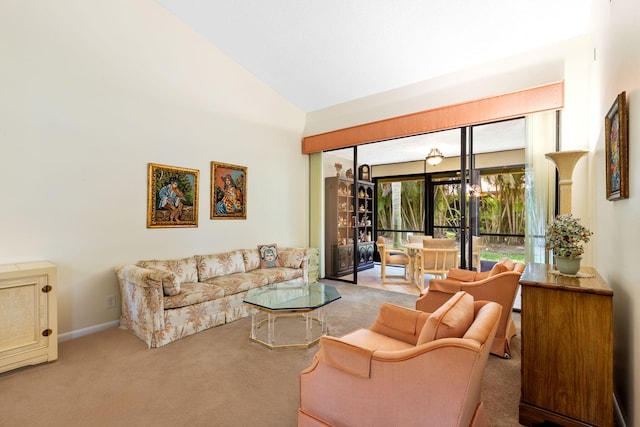 carpeted living room featuring high vaulted ceiling