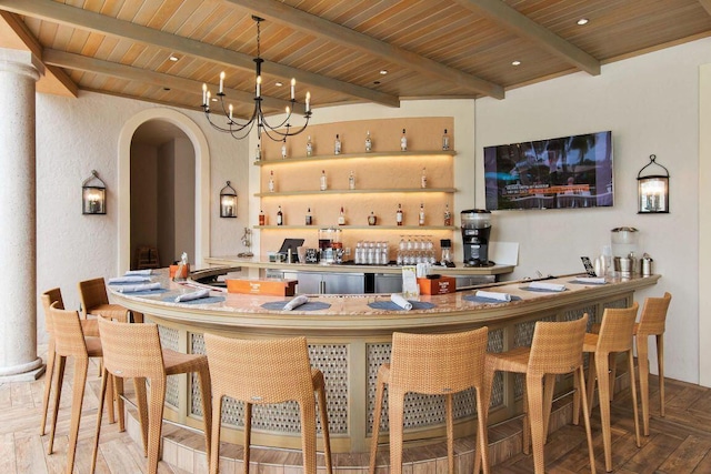 bar with beamed ceiling, parquet floors, a notable chandelier, and wood ceiling