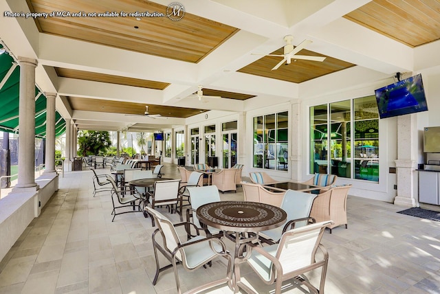 exterior space featuring ceiling fan