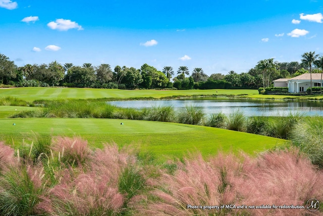 surrounding community with a water view