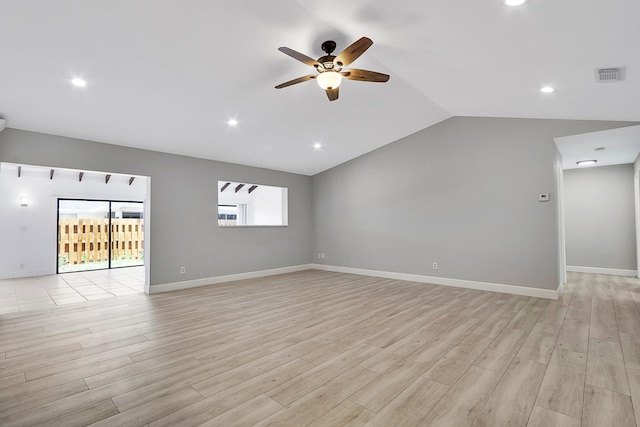 unfurnished living room with lofted ceiling, ceiling fan, and light hardwood / wood-style flooring