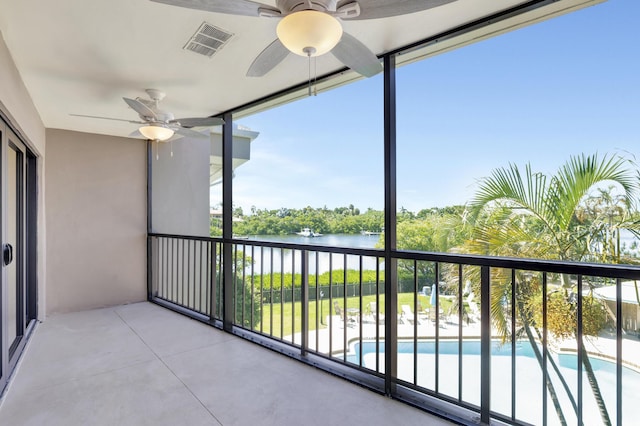 balcony featuring a water view