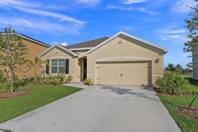 ranch-style home with a front yard and a garage