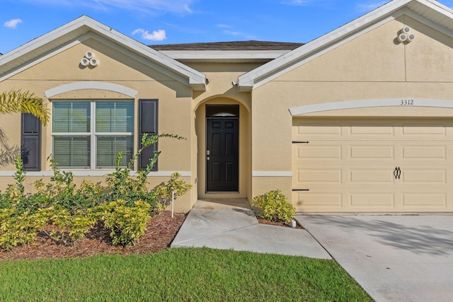 property entrance with a garage