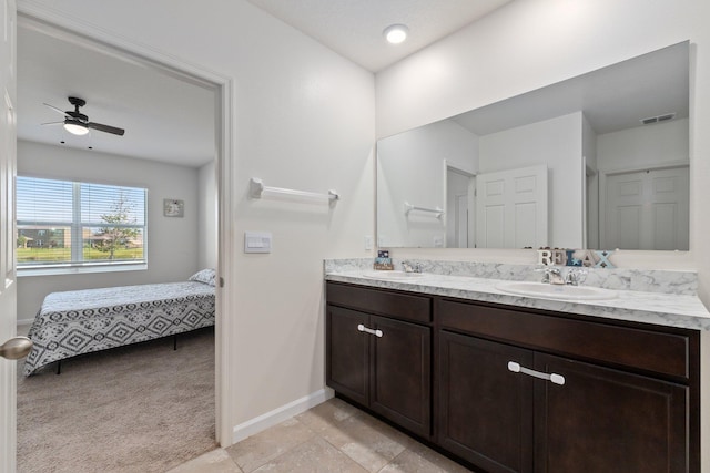 bathroom featuring vanity, tile patterned floors, and ceiling fan