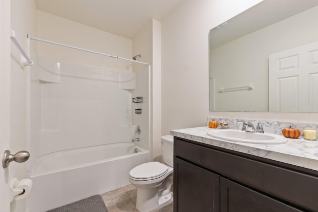 full bathroom featuring  shower combination, vanity, toilet, and tile patterned flooring