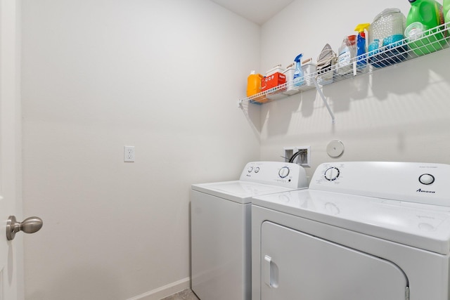 laundry room featuring separate washer and dryer