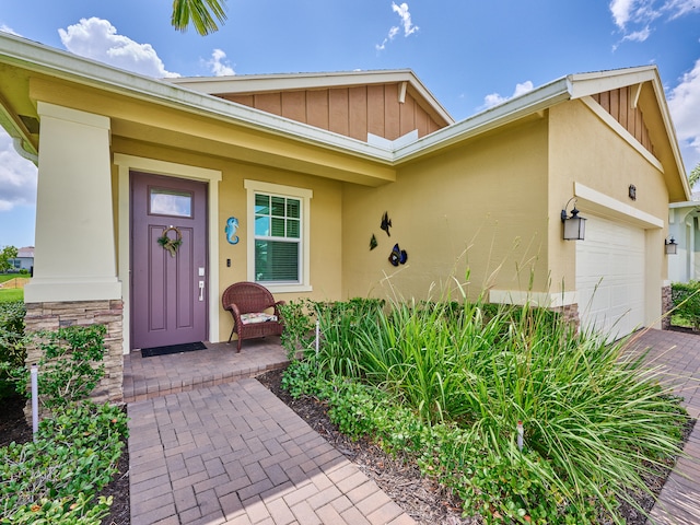 property entrance with a garage