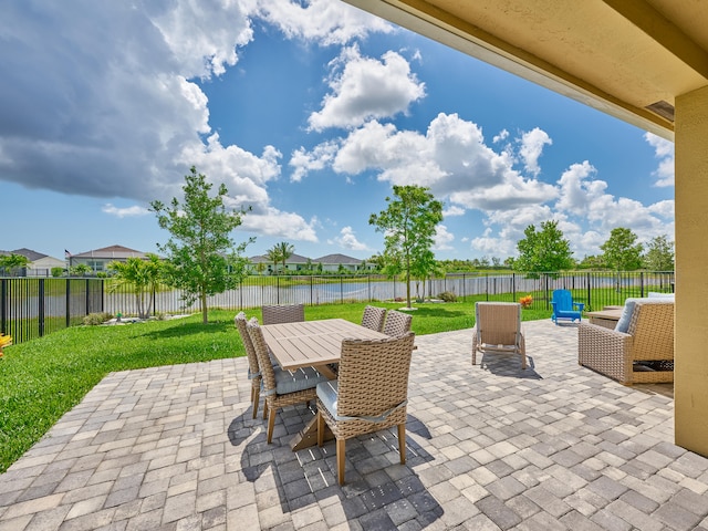 view of patio / terrace with a water view