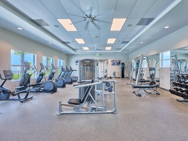 workout area featuring a paneled ceiling