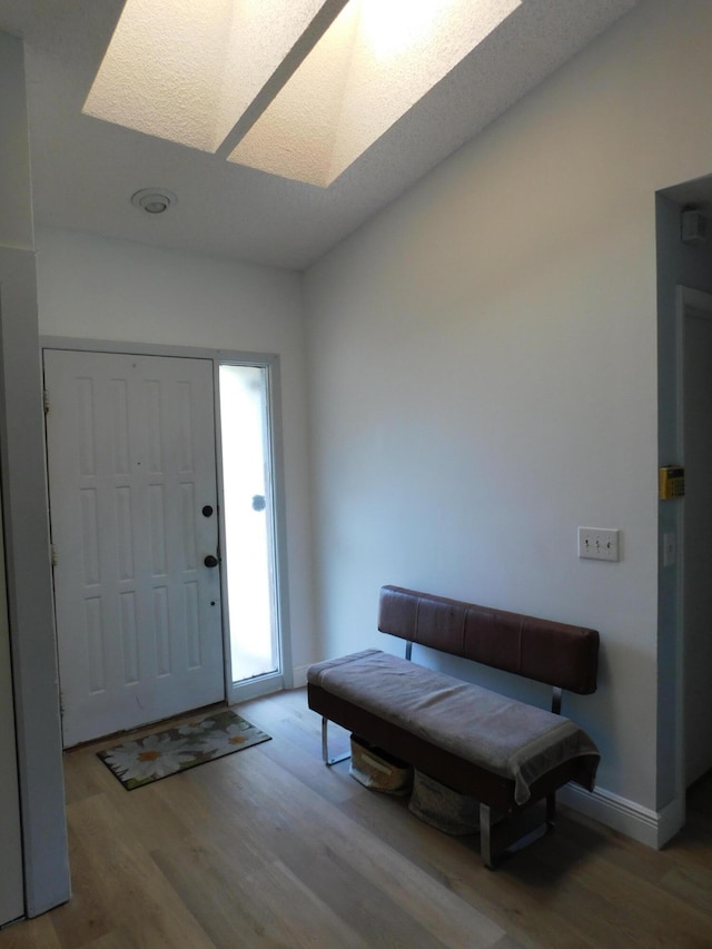 entrance foyer with hardwood / wood-style floors