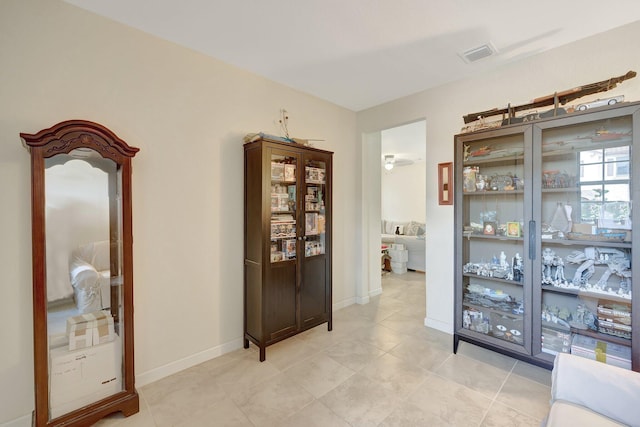 interior space with light tile patterned flooring