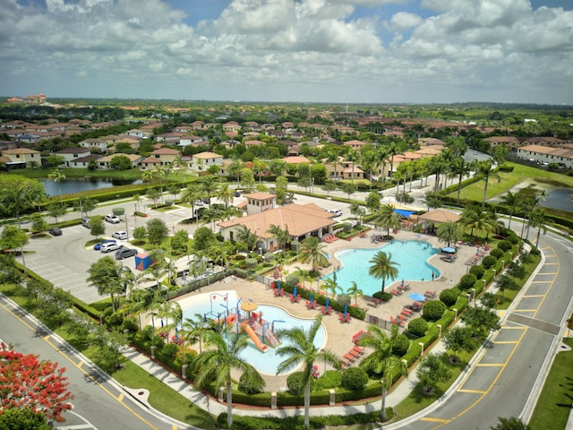 birds eye view of property featuring a water view