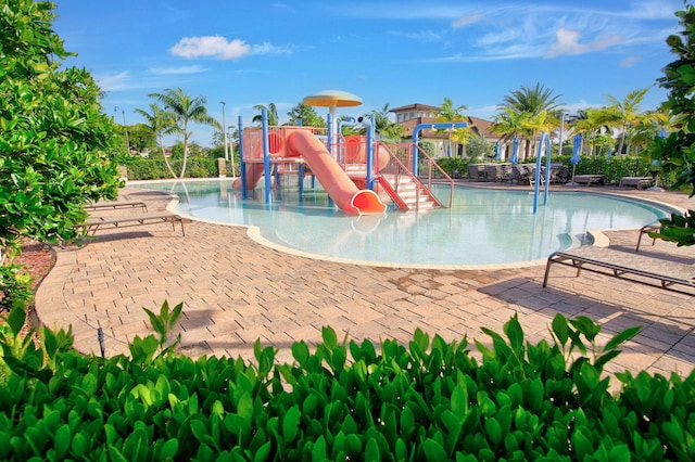 view of jungle gym with pool water feature