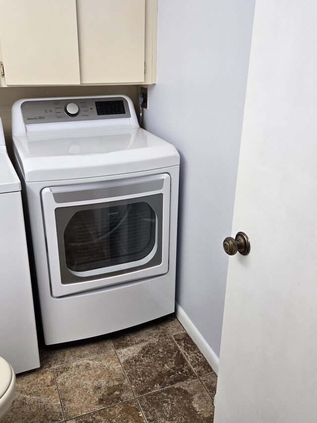 laundry room with separate washer and dryer