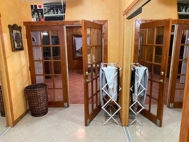 interior space featuring tile patterned floors and french doors