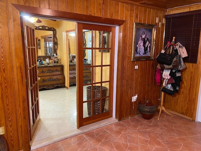 interior space featuring wooden walls