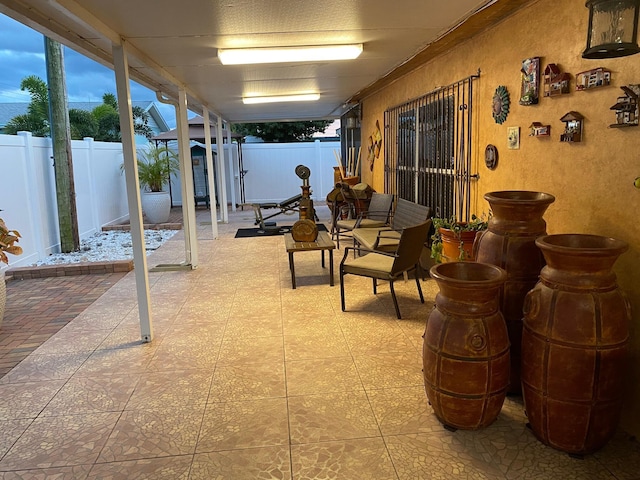 view of patio terrace at dusk