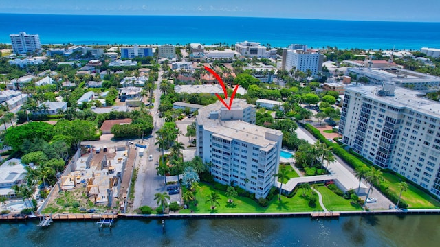 birds eye view of property featuring a water view