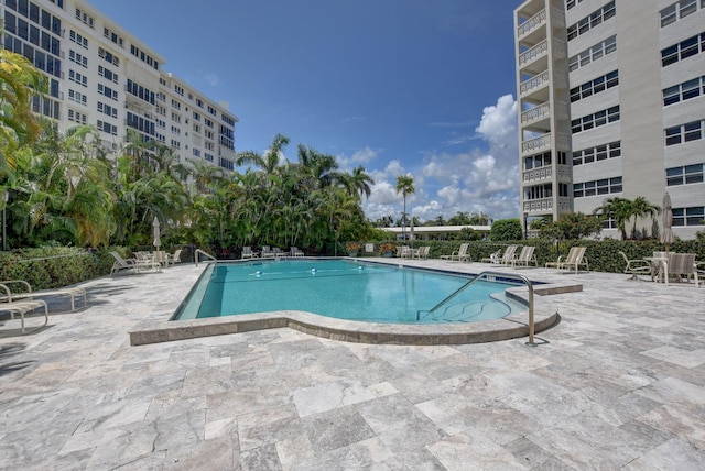 view of pool featuring a patio