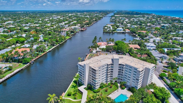 birds eye view of property featuring a water view