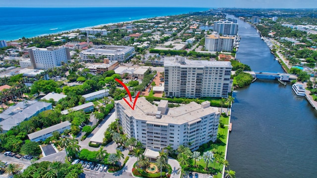 birds eye view of property featuring a water view