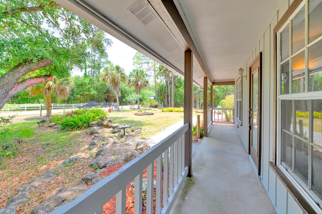 balcony featuring a porch