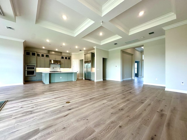 unfurnished living room with light wood-style flooring, coffered ceiling, visible vents, baseboards, and beamed ceiling