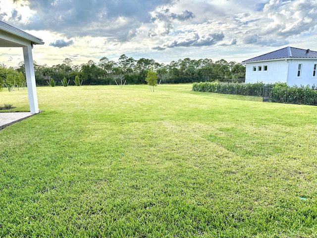 view of yard with fence