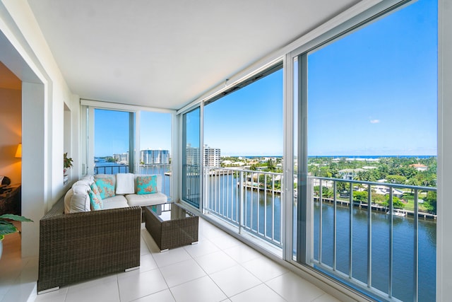 sunroom with a water view