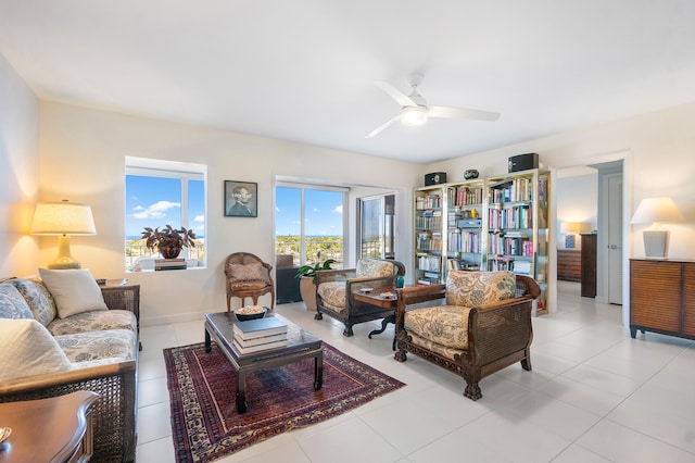 tiled living room with ceiling fan