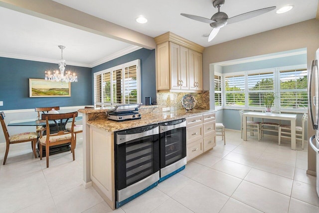 10695 Quail Covey Rd Azalea, Unit Azalea, Boynton Beach, FL 33436 - kitchen with beverage cooler, ornamental molding, cream cabinetry, decorative backsplash, and light stone counters
