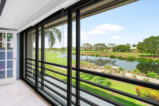 10695 Quail Covey Rd Azalea, Unit Azalea, Boynton Beach, FL 33436 - unfurnished sunroom with a water view