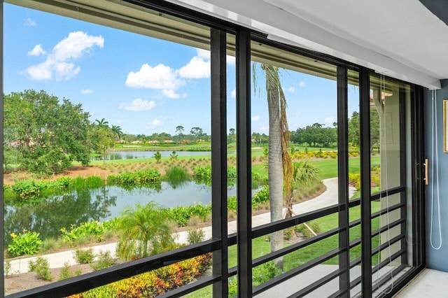 10695 Quail Covey Rd Azalea, Unit Azalea, Boynton Beach, FL 33436 - doorway with a water view and view of scattered trees