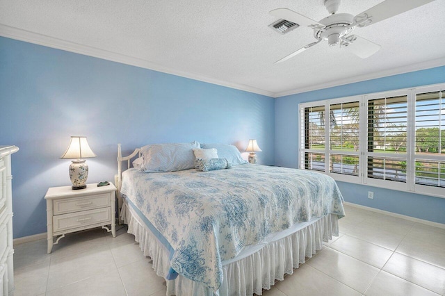 10695 Quail Covey Rd Azalea, Unit Azalea, Boynton Beach, FL 33436 - bedroom with ornamental molding, light tile patterned floors, a textured ceiling, a ceiling fan, and baseboards