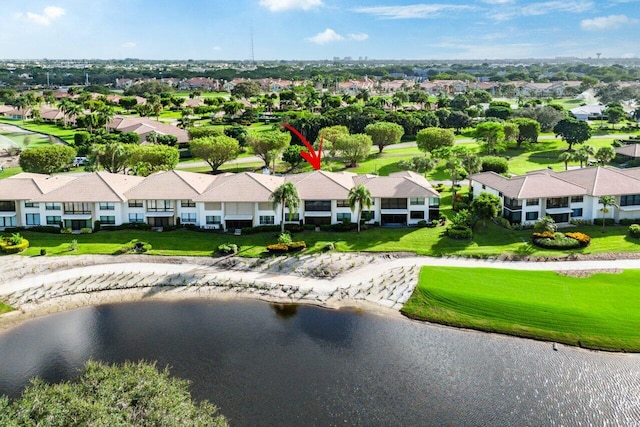 drone / aerial view with a water view