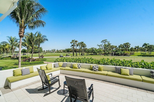 10695 Quail Covey Rd Azalea, Unit Azalea, Boynton Beach, FL 33436 - view of patio / terrace with an outdoor living space and view of golf course