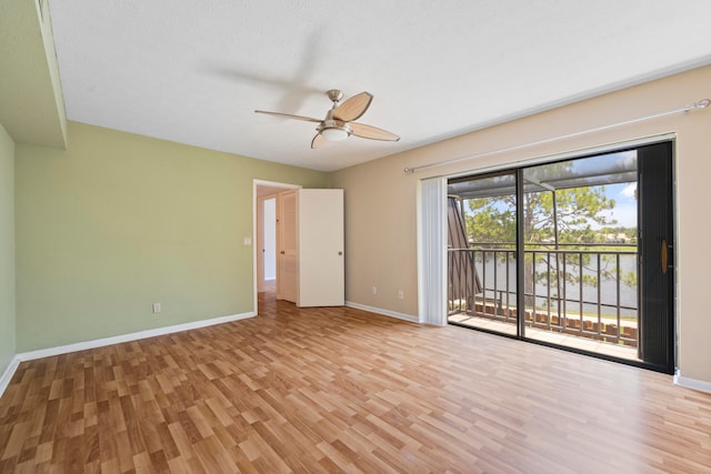 unfurnished room with ceiling fan and light hardwood / wood-style flooring