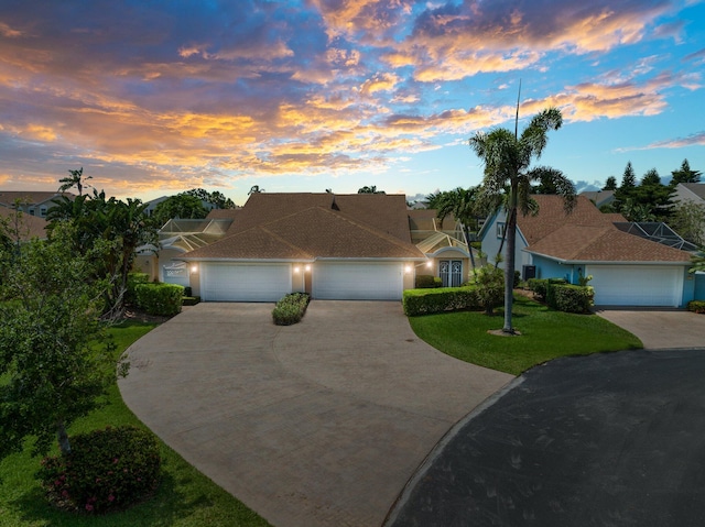 single story home featuring a garage