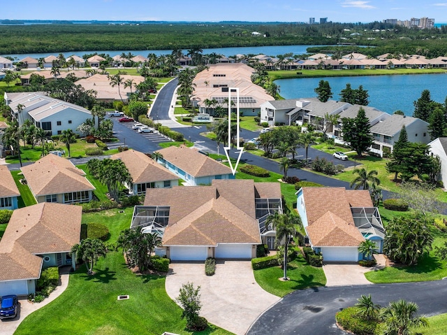 birds eye view of property featuring a water view