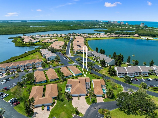 drone / aerial view featuring a water view