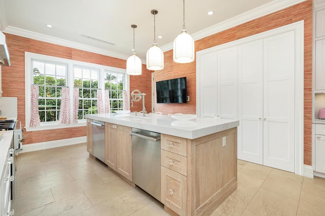 kitchen with dishwasher, light brown cabinets, a kitchen island with sink, hanging light fixtures, and light tile patterned floors