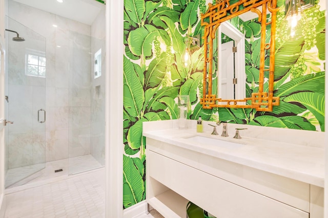 bathroom featuring vanity and walk in shower