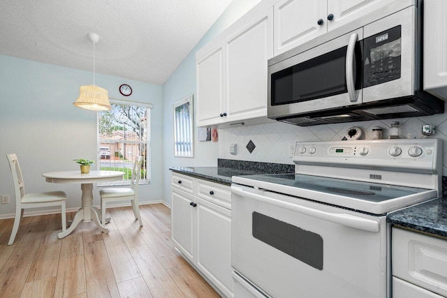 kitchen featuring pendant lighting, tasteful backsplash, white cabinetry, light hardwood / wood-style flooring, and white electric range oven