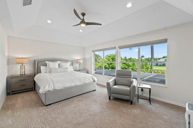 bedroom with ceiling fan and light carpet