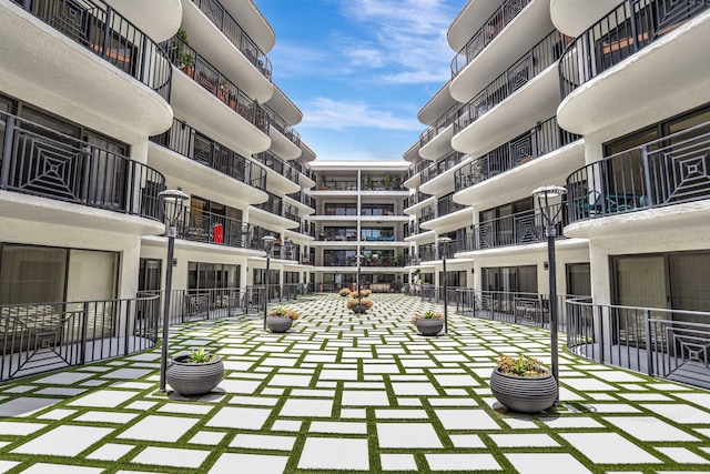 view of property's community with a patio area