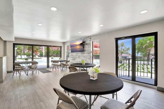 dining room with light wood-type flooring